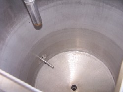 Used approximately 50 gallon vertical open top T-316 S/S insulated tank
