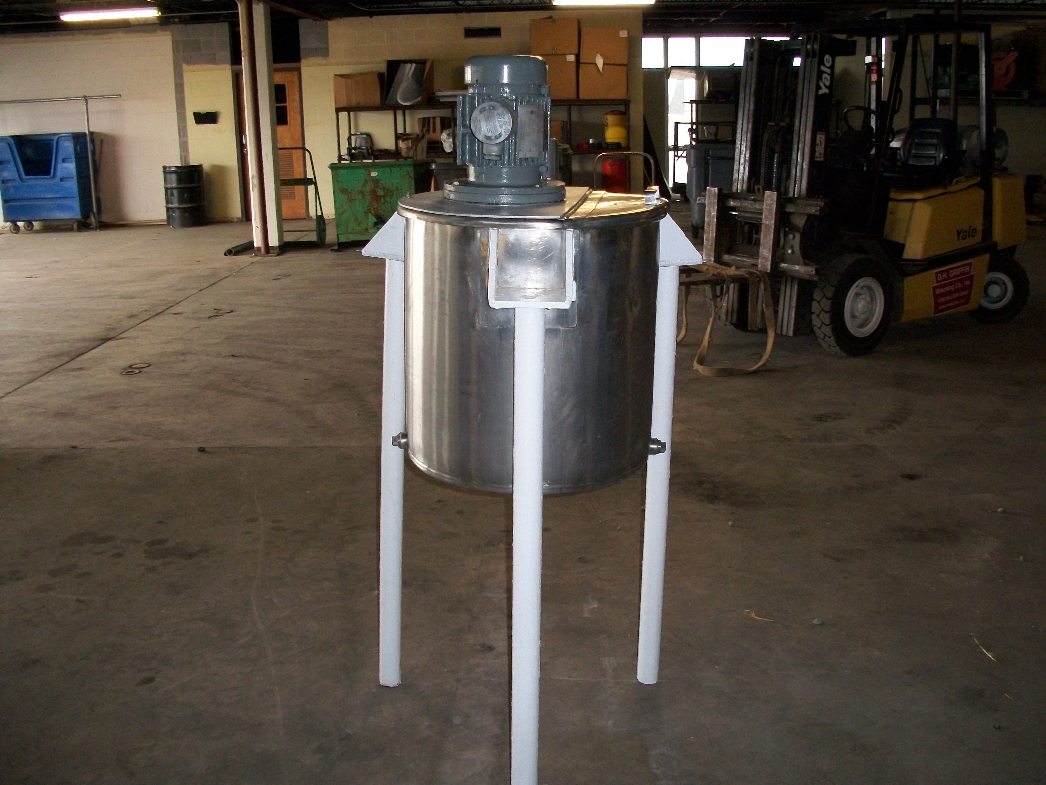 Used approximately 50 gallon stainless steel vertical mix tank