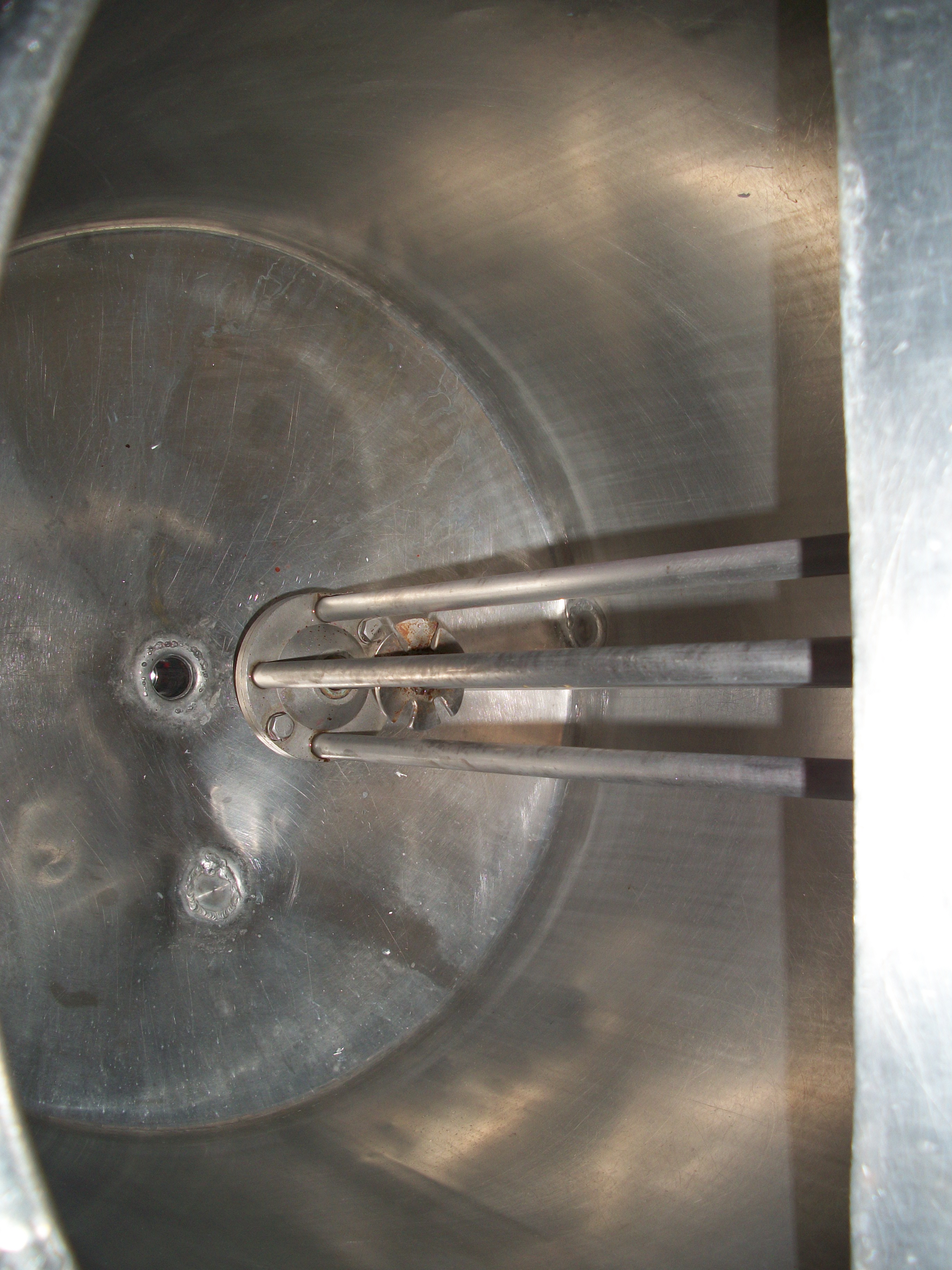 Used approximately 50 gallon stainless steel vertical mix tank