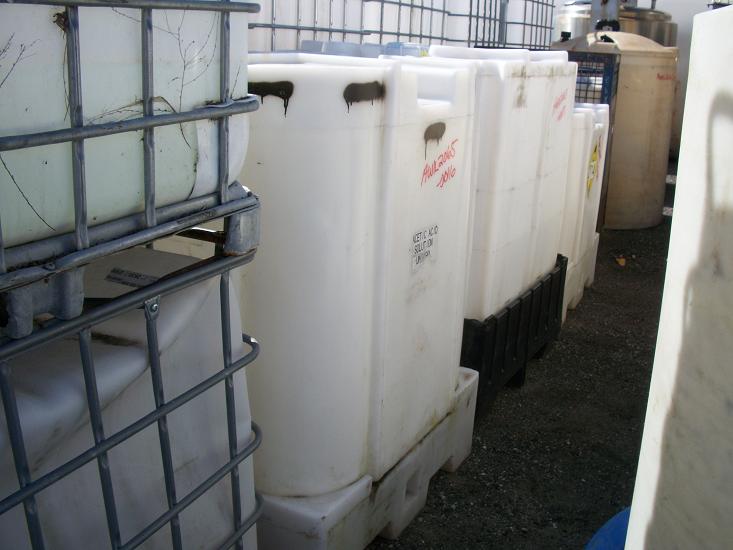 Used approximately 275 gallon square poly tote