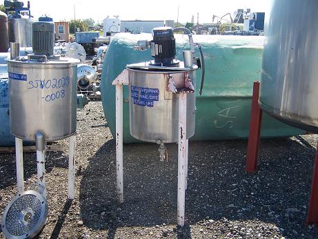 Used approximately 50 gallon stainless steel vertical mix tank
