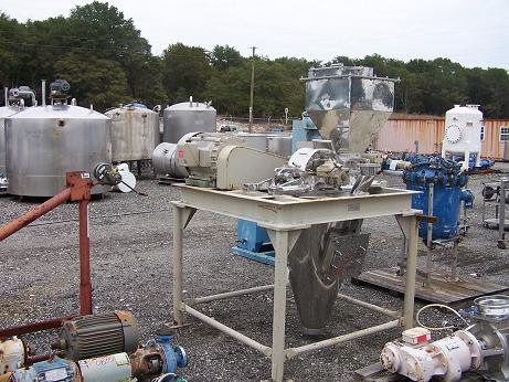Used Fuji Paudal Co. 304 stainless steel hammer mill.  Model CIW-25