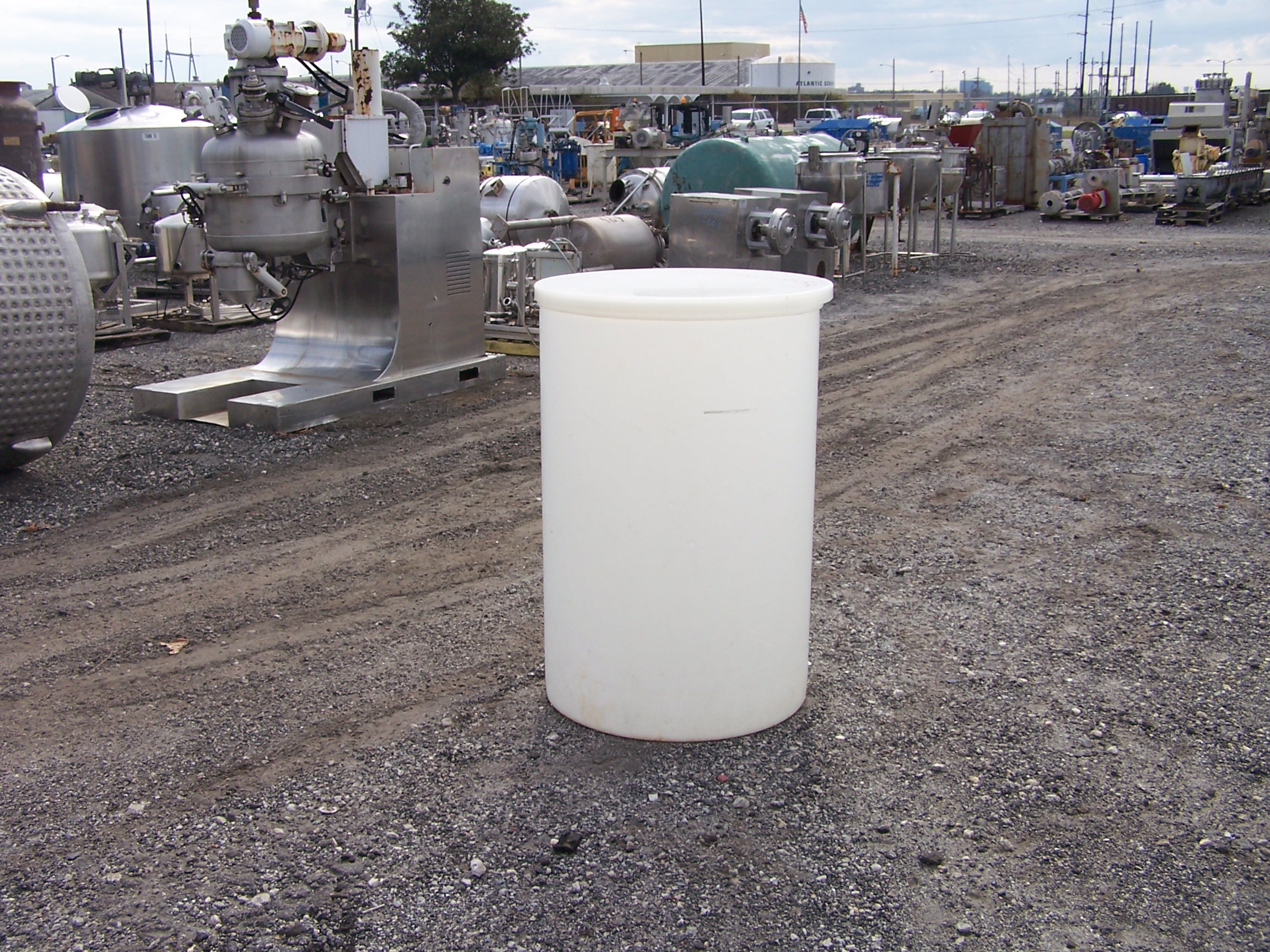 Used approximately 140 gallon poly vertical tank